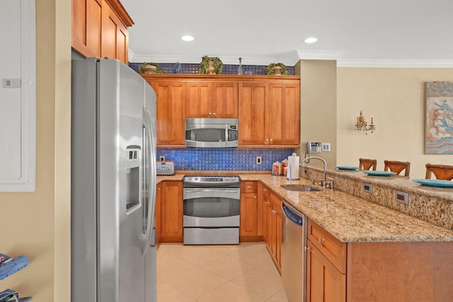 kitchen featuring sink, light stone counters, light tile patterned floors, stainless steel appliances, and backsplash