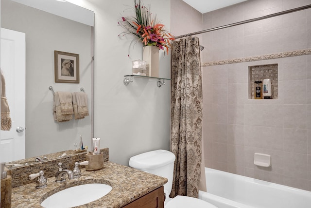 full bathroom featuring vanity, toilet, and shower / bath combo with shower curtain