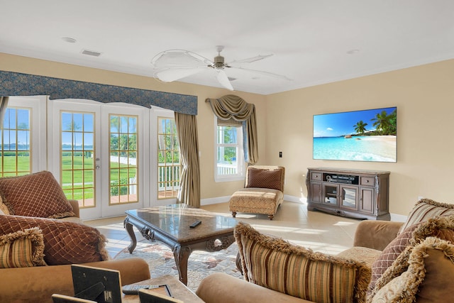 tiled living room featuring ceiling fan