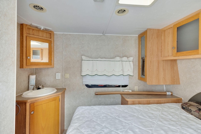 bedroom with sink