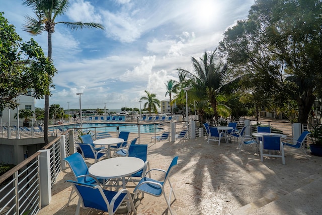 view of patio with a community pool