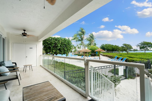 balcony featuring ceiling fan