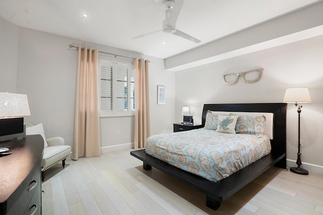 bedroom featuring ceiling fan and light hardwood / wood-style flooring