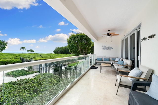 balcony featuring ceiling fan