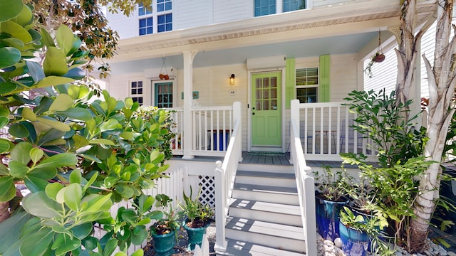 entrance to property with a porch