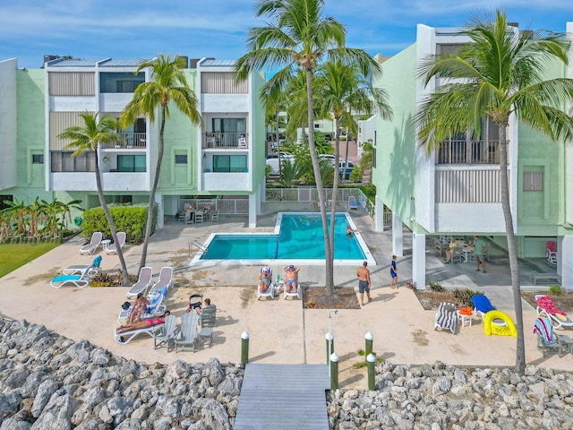 view of swimming pool featuring a patio area