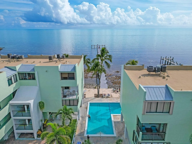 birds eye view of property featuring a water view