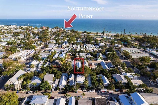 aerial view with a residential view and a water view