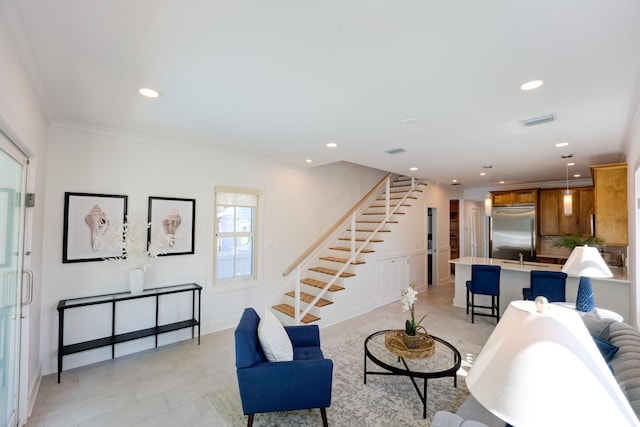 living area with visible vents, baseboards, stairway, ornamental molding, and recessed lighting