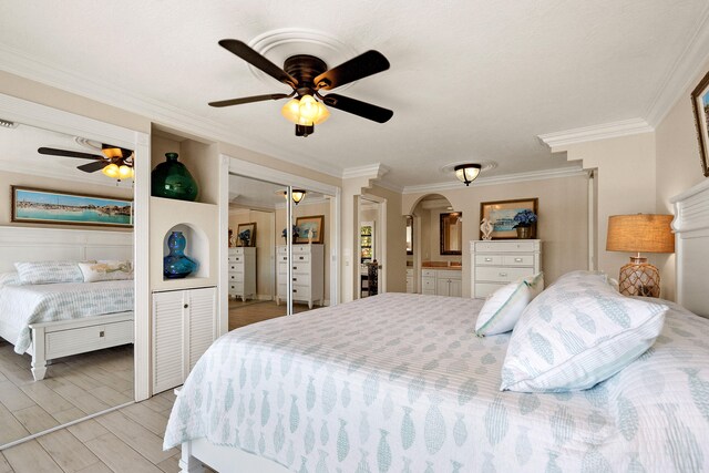 bedroom with crown molding and ceiling fan