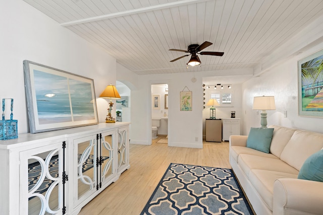 living room featuring ceiling fan, light hardwood / wood-style floors, and wooden ceiling