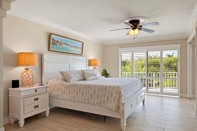 bedroom featuring access to exterior, ornamental molding, ceiling fan, and light wood-type flooring