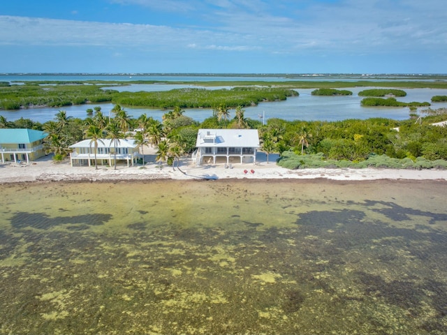 aerial view featuring a beach view and a water view