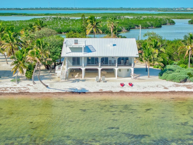 bird's eye view with a water view