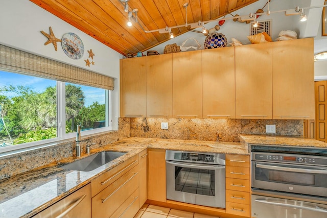 kitchen featuring sink, light stone countertops, decorative backsplash, wooden ceiling, and light brown cabinets