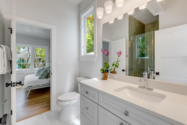 1114 Grinnell St, Key West, FL 33040 - full bathroom featuring plenty of natural light, vanity, a tile shower, and tile patterned floors