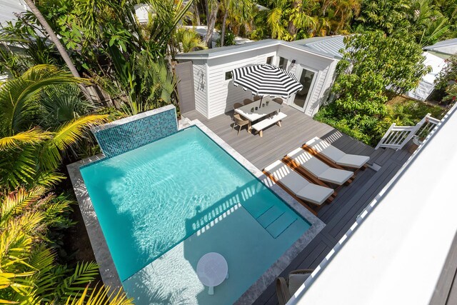 1114 Grinnell St, Key West, FL 33040 - swimming pool with a wooden deck and outdoor dining space