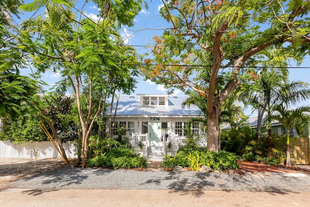 1114 Grinnell St, Key West, FL 33040 - view of front of property featuring a fenced front yard and a metal roof