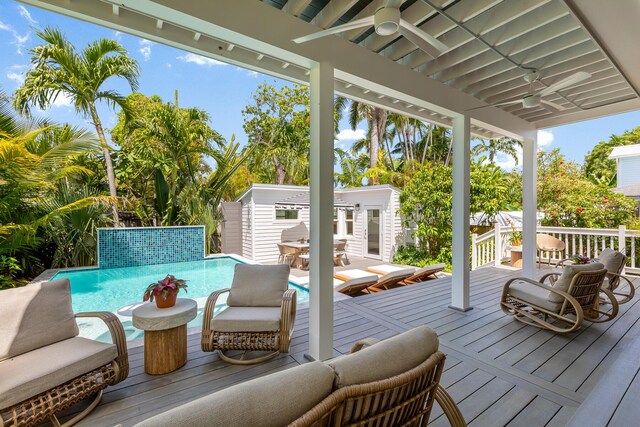 1114 Grinnell St, Key West, FL 33040 - deck featuring a ceiling fan, an outbuilding, and an outdoor pool