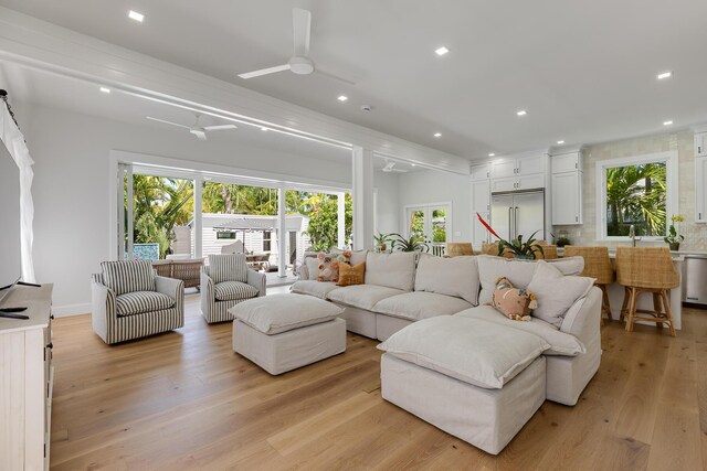 1114 Grinnell St, Key West, FL 33040 - living area featuring healthy amount of natural light, recessed lighting, a ceiling fan, and light wood finished floors
