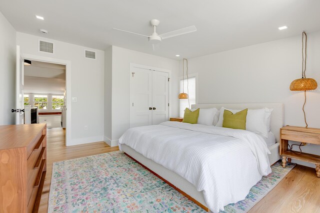 1114 Grinnell St, Key West, FL 33040 - bedroom with light wood-style floors, a closet, and ceiling fan