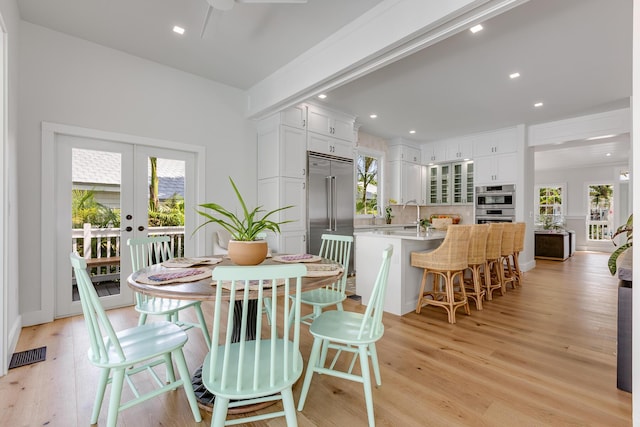 1114 Grinnell St, Key West, FL 33040 - dining room featuring healthy amount of natural light, light wood-type flooring, and recessed lighting