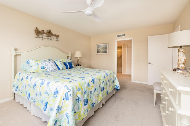 bedroom with light colored carpet and ceiling fan