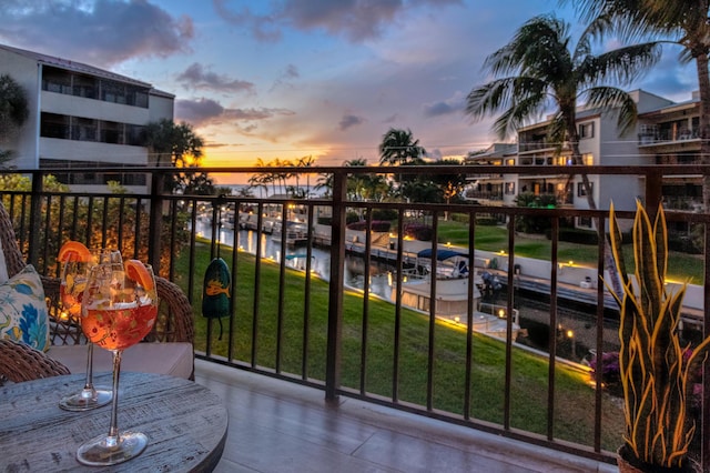 view of balcony at dusk