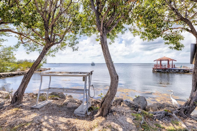 property view of water with a gazebo