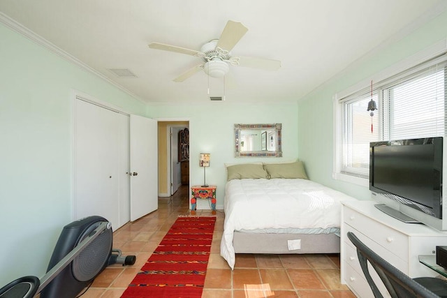 1617 Jamaica Dr, Key West, FL 33040 - bedroom with crown molding, a closet, ceiling fan, and light tile patterned flooring
