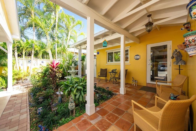 1617 Jamaica Dr, Key West, FL 33040 - sunroom featuring vaulted ceiling with beams