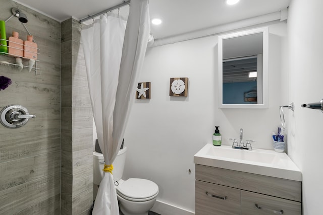 66 Seagate Blvd, Key Largo, FL 33037 - full bath featuring vanity, tiled shower, toilet, baseboards, and recessed lighting