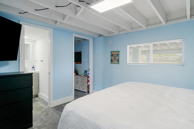 66 Seagate Blvd, Key Largo, FL 33037 - bedroom with beamed ceiling and ensuite bath