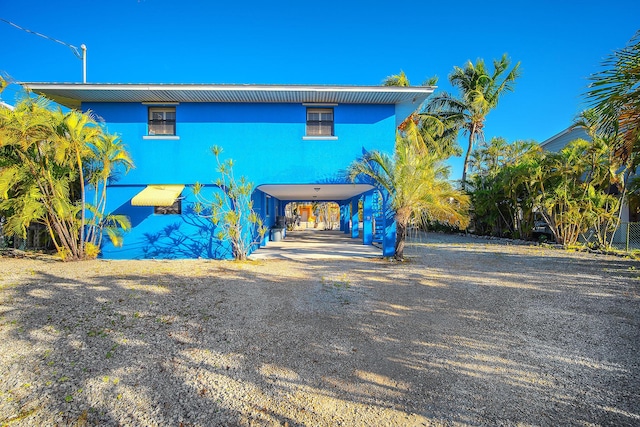 view of front facade featuring a carport