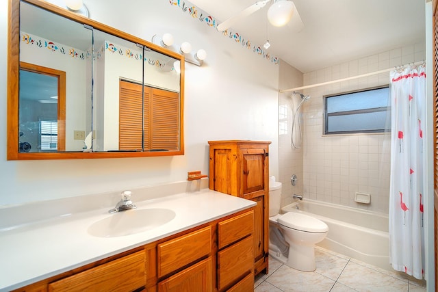 full bathroom with shower / tub combo with curtain, tile patterned floors, toilet, and vanity