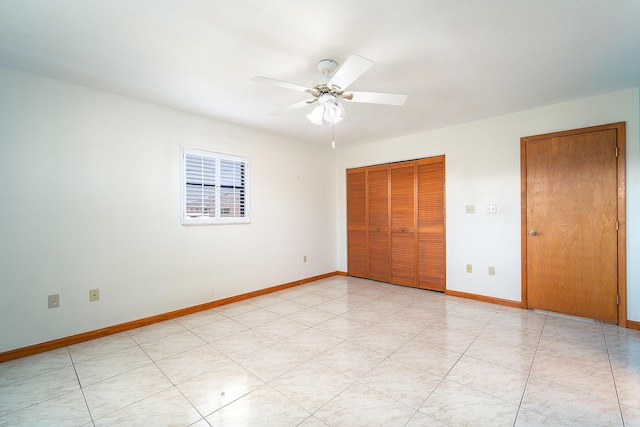 unfurnished bedroom with a closet and ceiling fan