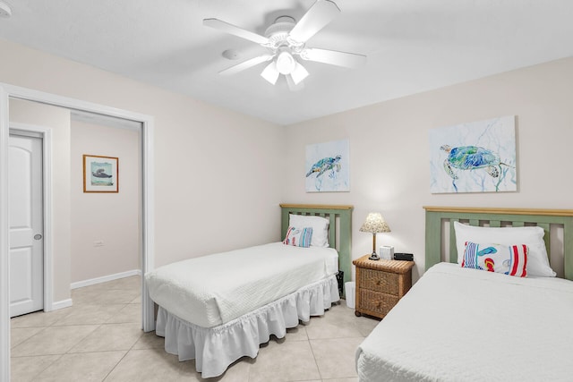 460 11th St, Key Colony, FL 33051 - bedroom featuring light tile patterned flooring and a ceiling fan