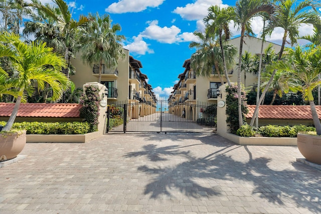 view of gate featuring a fenced front yard