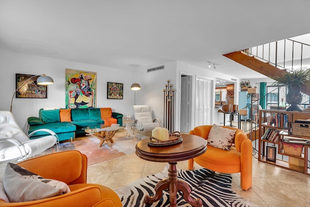 1616 Atlantic Blvd Unit 5, Key West, FL 33040 - living area with light tile patterned floors and stairway