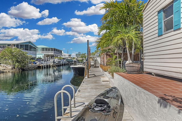 102 Sands Ln, Layton, FL 33001 - dock area featuring a water view