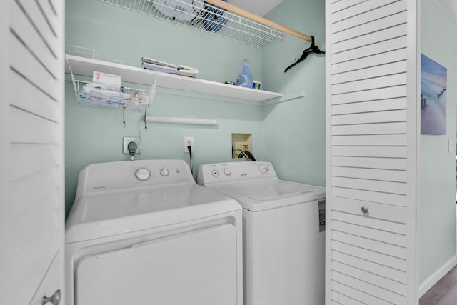 laundry area with washer and clothes dryer