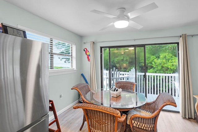 dining area featuring ceiling fan and light hardwood / wood-style floors