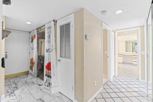 hallway featuring washer / dryer