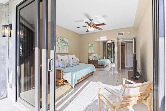 bedroom featuring light tile patterned floors