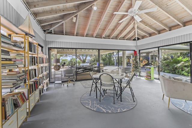 unfurnished sunroom featuring lofted ceiling with beams, wood ceiling, and ceiling fan