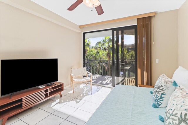 bedroom with ceiling fan, access to exterior, and tile patterned flooring