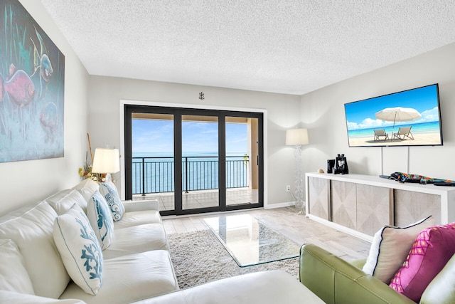 1001 W Ocean Dr Unit 1-305, Key Colony, FL 33051 - living area with wood finished floors and a textured ceiling