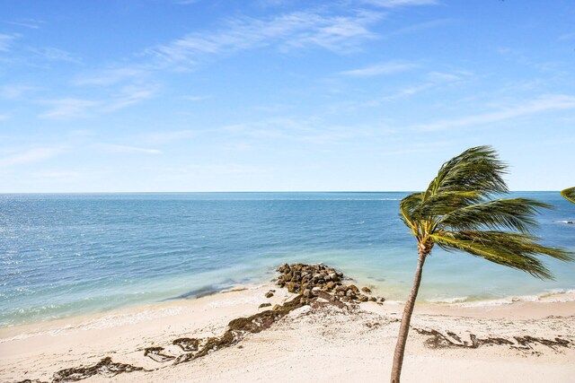 1001 W Ocean Dr Unit 1-305, Key Colony, FL 33051 - water view featuring local beach