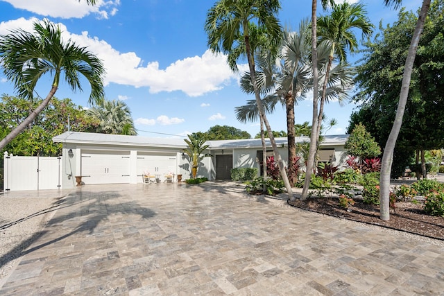 single story home with a garage