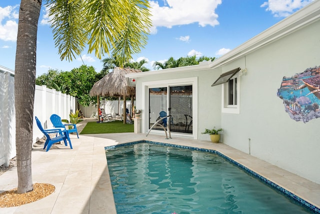 view of swimming pool featuring a patio